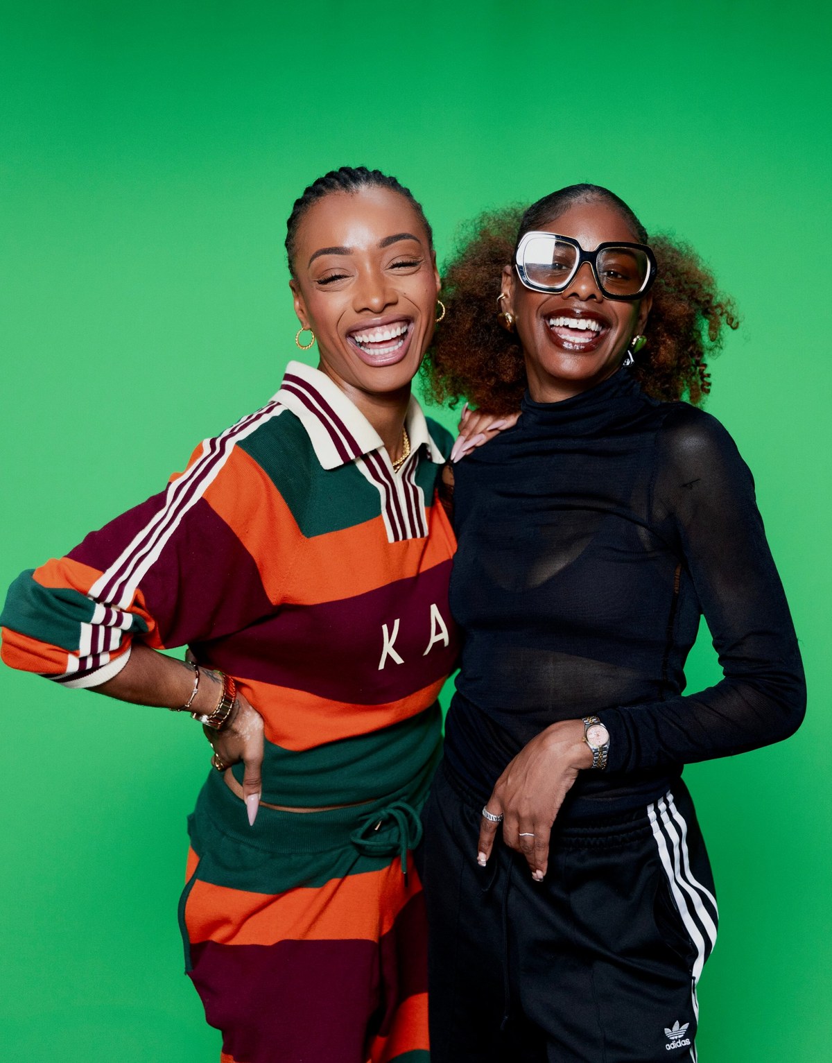 Paige Lewin and ZeZe Millz laughing together